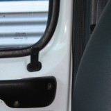 Mounting position on the cab door pull (1256_2).